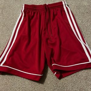 red adidas shorts